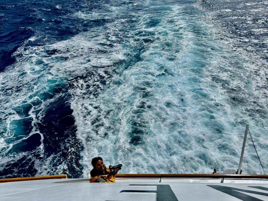 Nirmal photographing on the Drake passage in Antarctica
