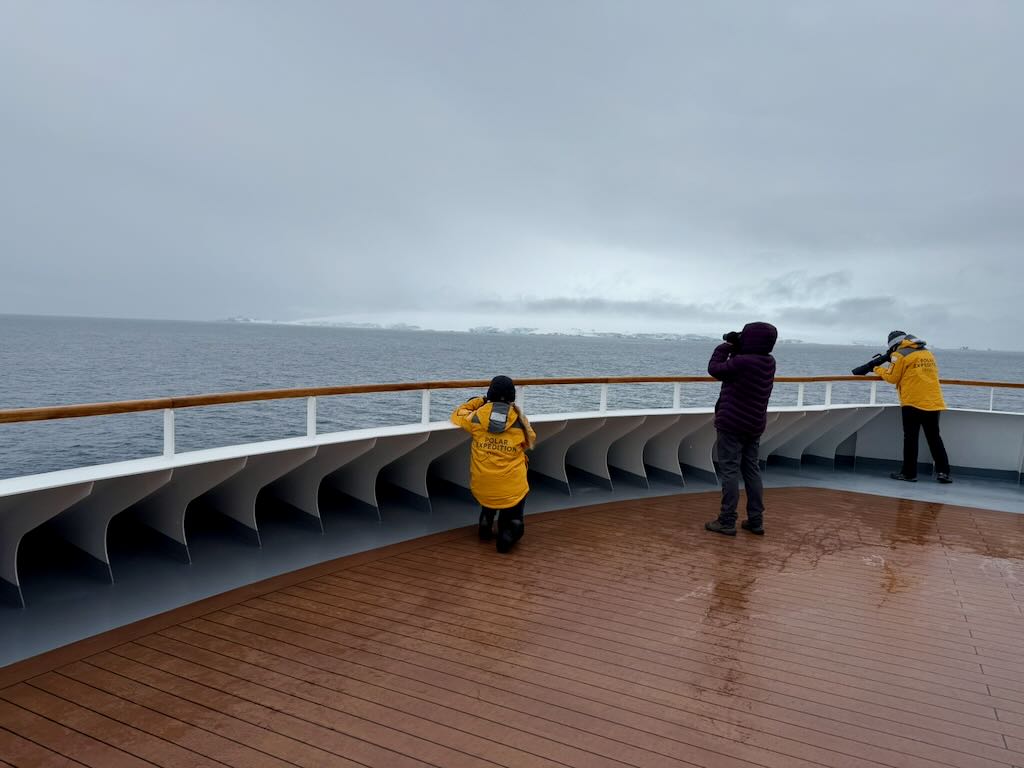 Photographing the first views of Antarctica, upon corssing the Drake passage