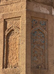 Close-up of ancient geometric blue and brick tilework decoration on a wall inside the Erbil Citadel, Iraqi Kurdistan