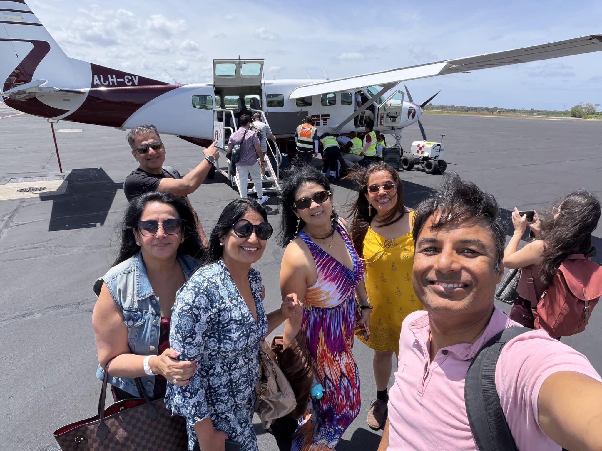 Boarding a Tropic Air 12-seater in Cancun, Mexico, for a 90-minute flight to Belize City