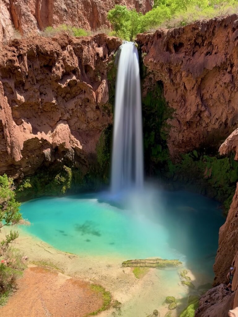 Havasu Falls, a turquoise waterfall in the Havasupai Tribe's land in the Grand Canyon